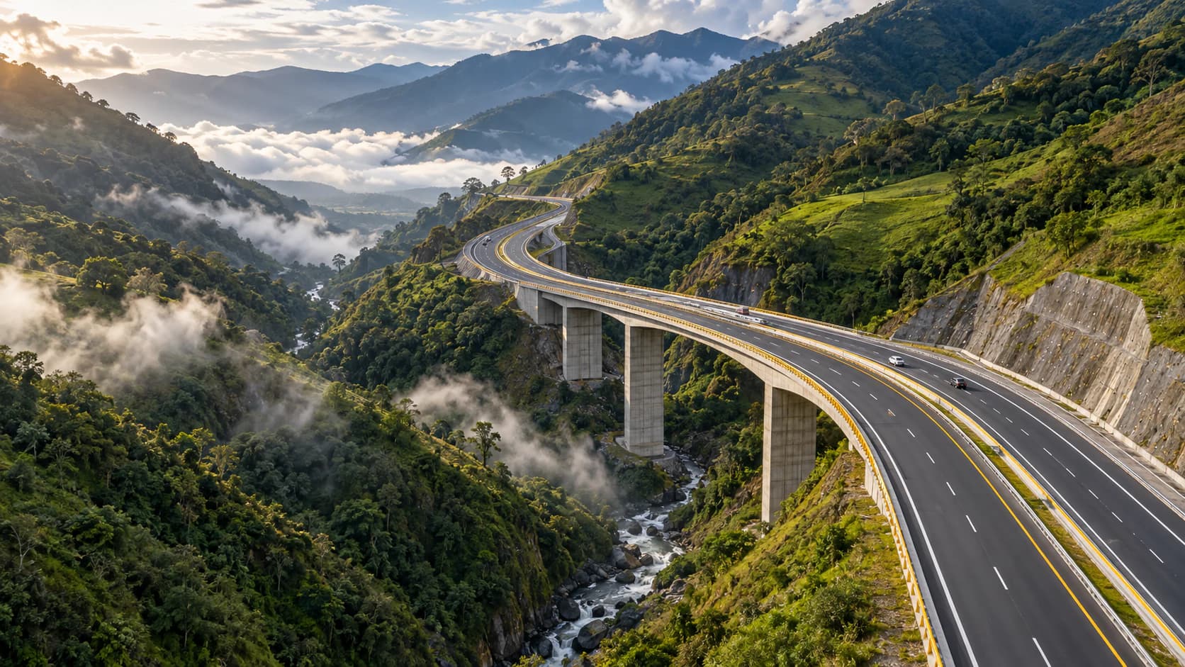 Dual-carriageway viaduct crossing forested, mist-covered Andean mountains (illustrative image)